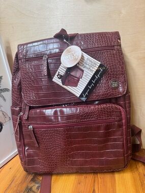 Diaper bag backpack burgundy faux leather